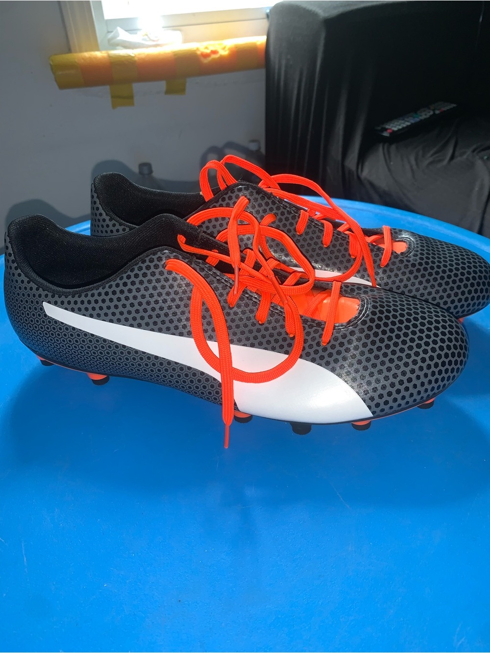 Men’s Black/White Soccer Cleats with Orange Laces